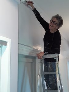 Customer Irene Walton decorates her new house, in the 4th town where she has been a happy Netspeed customer