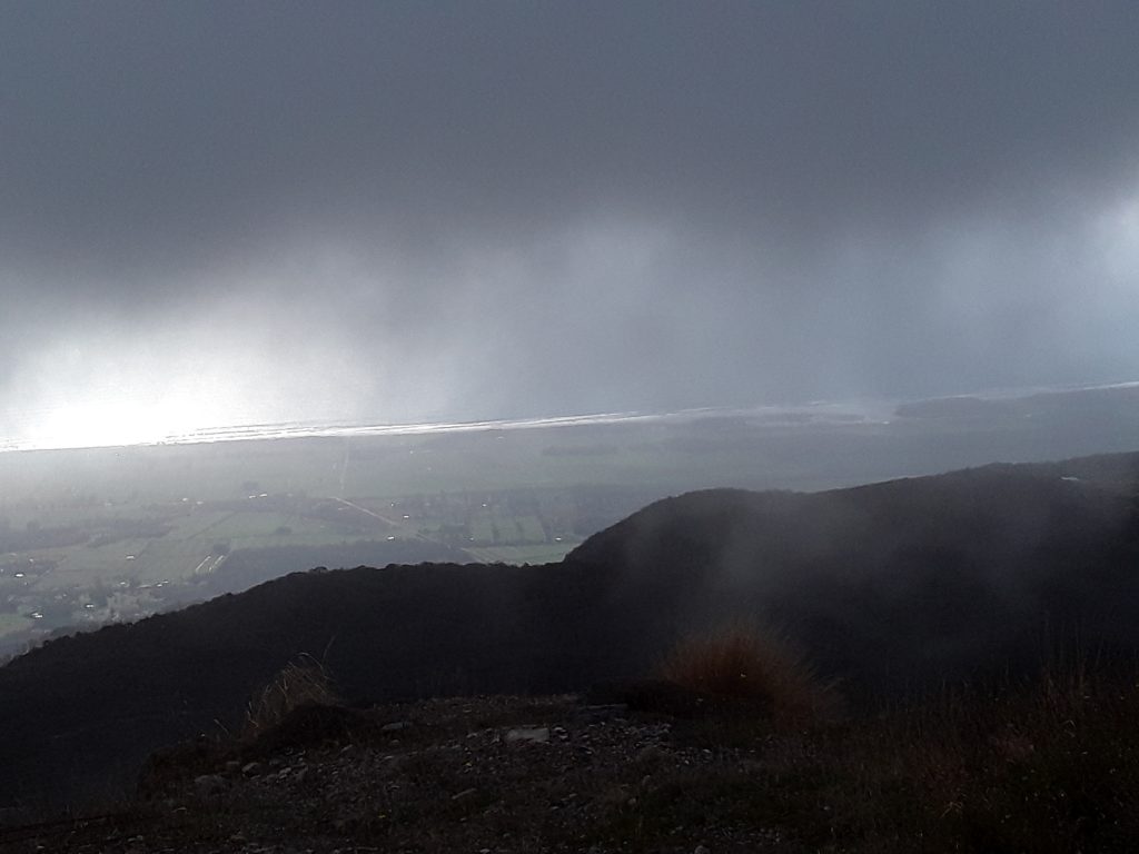 A fleeting glimpse of the Tasman from Sewell Peak